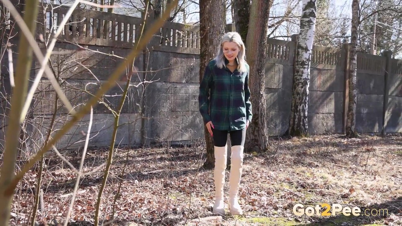Blonde girl Vasya takes a badly needed piss in a backyard