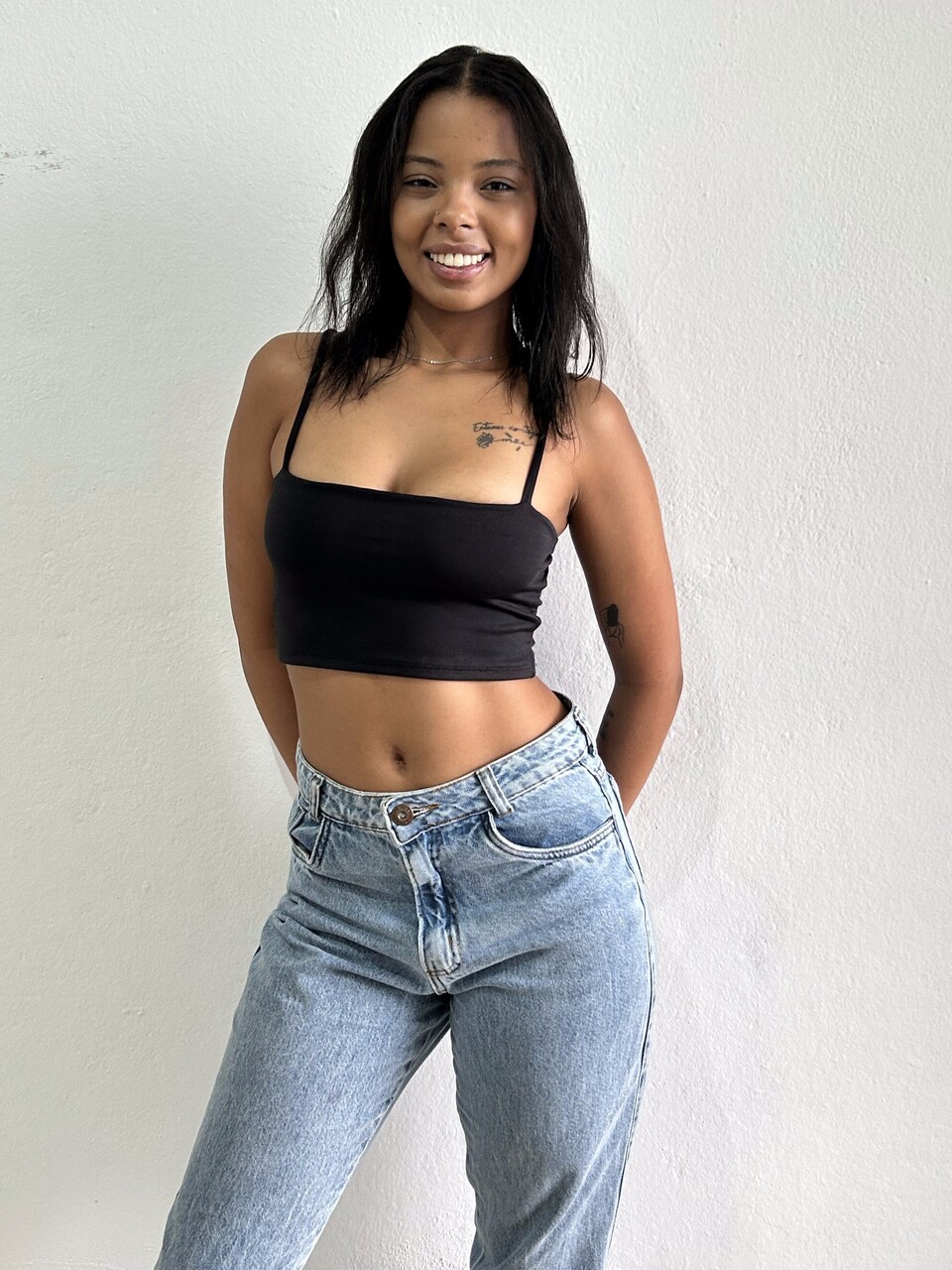 Latina girl takes selfies in a variety of outfits and locations