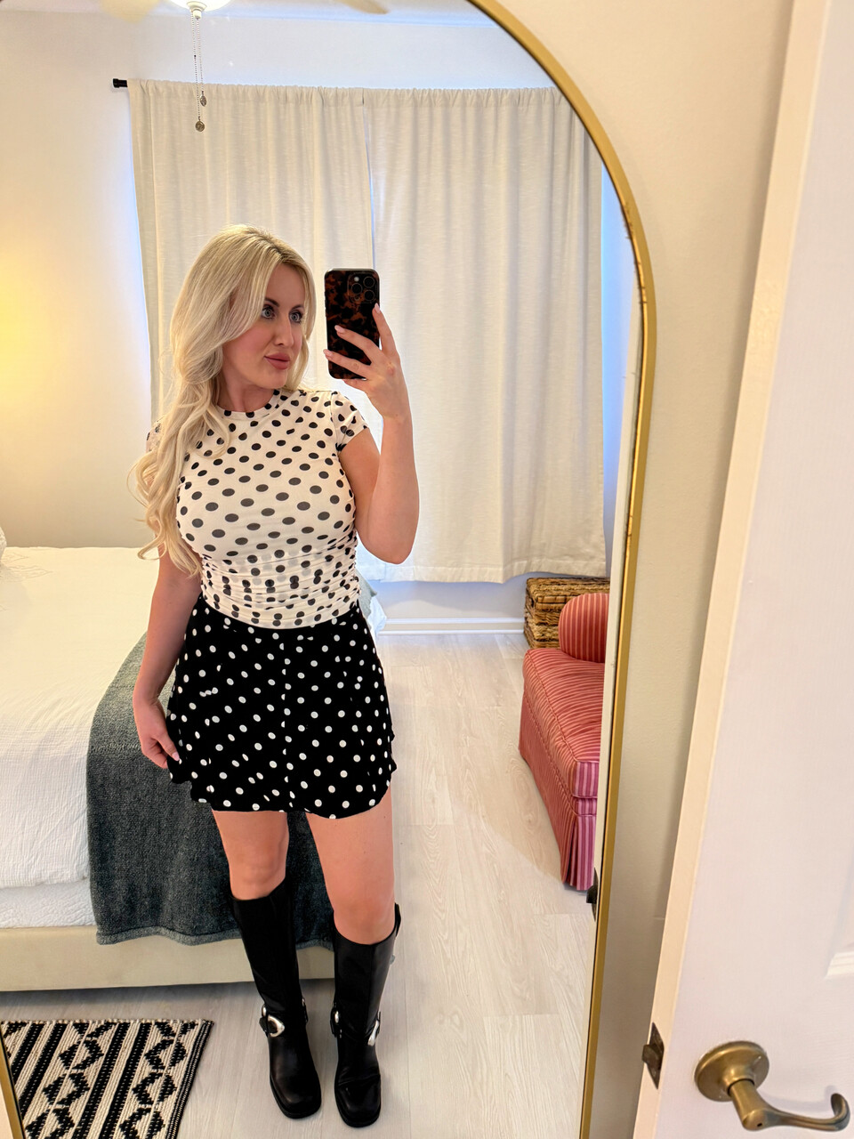 Sexy blonde with big boobs takes selfies in a variety of outfits