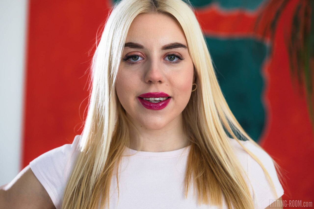 Blonde teen Carolyne Marian masturbates with a vibrator in a cropped T-shirt