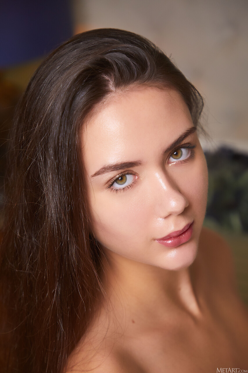 Nice teen Vixi Rafi slips off her lingerie before striking great nude poses