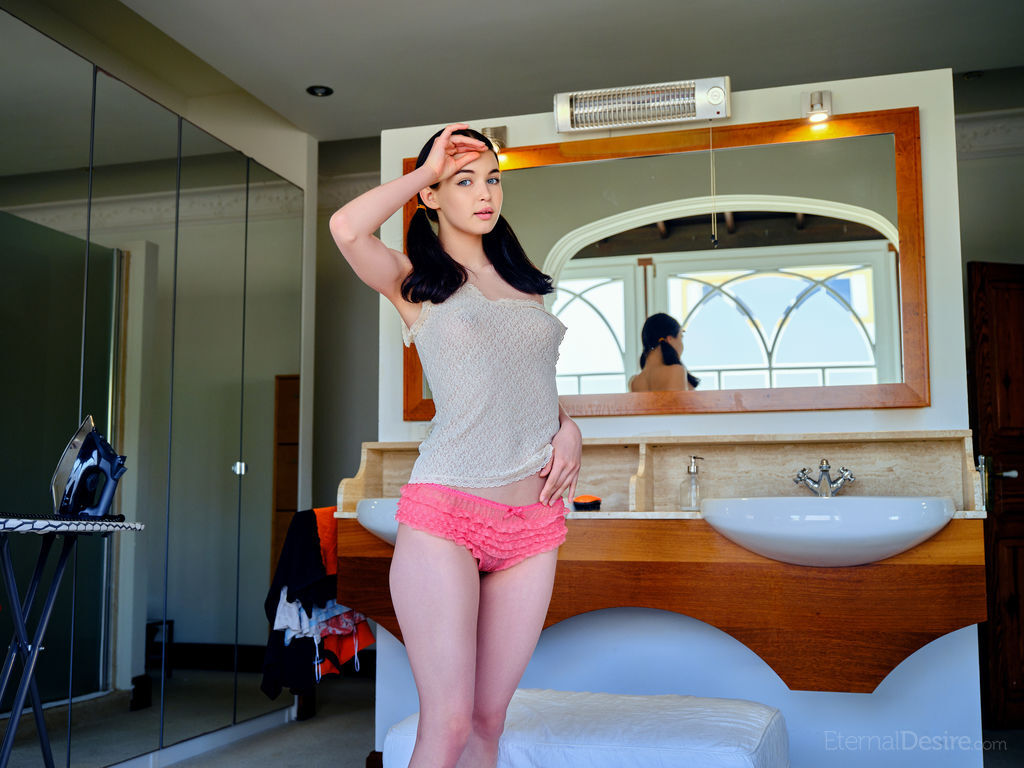 Dark haired teen Tutsi gets naked in pigtails while ironing