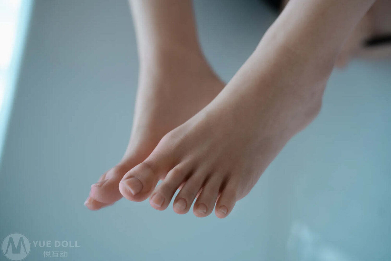 Pretty girl with a great body takes a bath in a swimsuit while naked