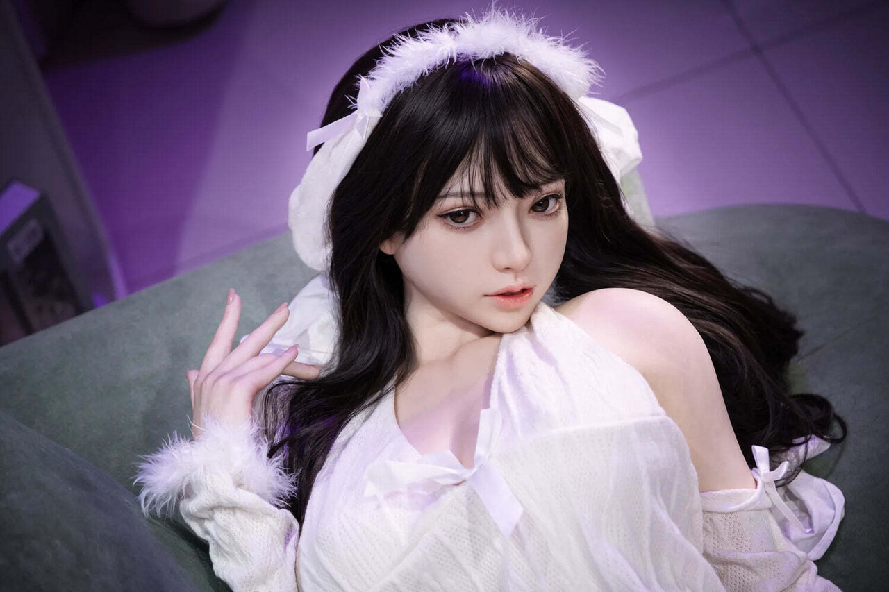 Beautiful anime girl in cosplay releases her perfect body from clothing