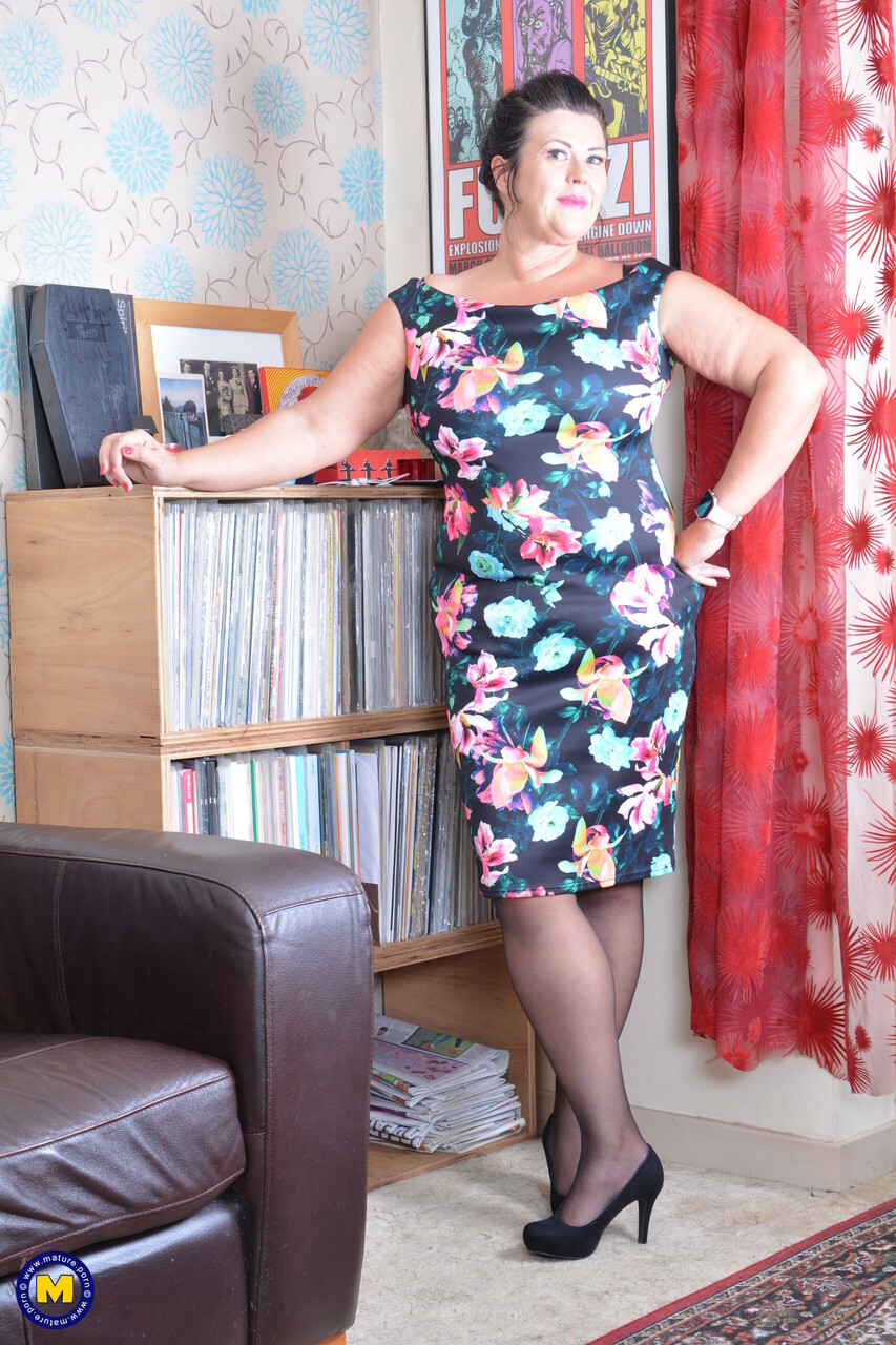 Older BBW strips off her dress and lingerie to masturbate in nylons