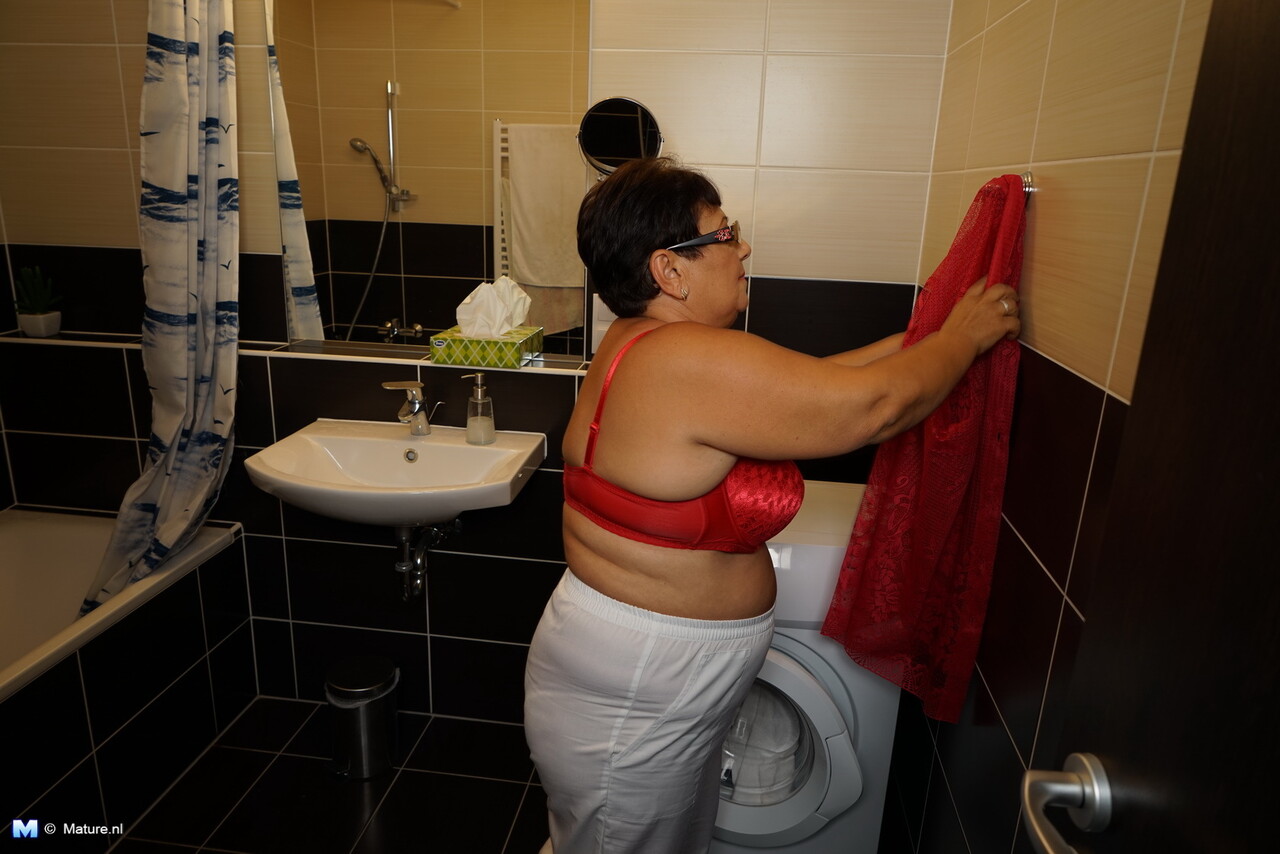 Old woman with glasses and big saggy tits gets banged by a younger man