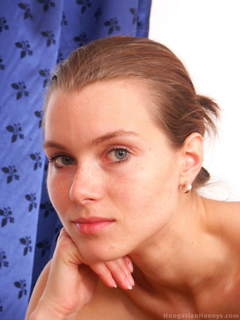 Skinny girl with striking eyes gets totally naked in front of a mirror
