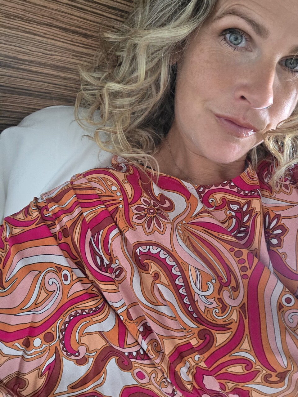 Solo girl with curly hair takes selfies of her pink pussy in a mirror