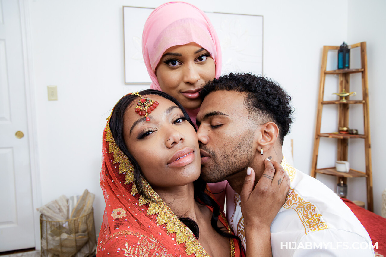 Hijabi women have sexual relations with a black man at the same time