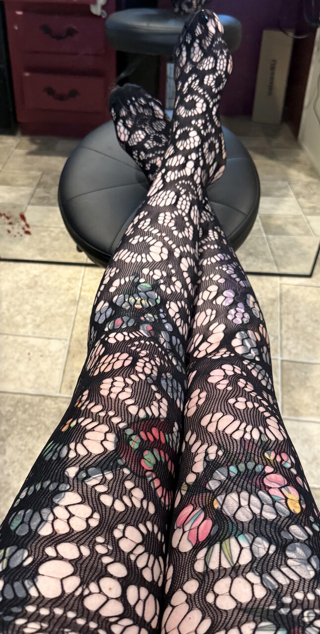 Tattooed amateur shows her horny pussy in sexy hosiery and glasses