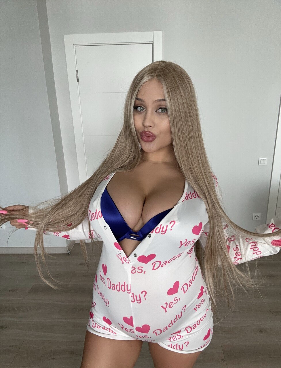 Blonde girl in sexy lingerie flashing huge tits in sexy SFW solo shoot