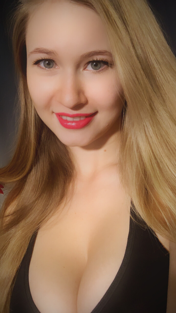 Beautiful blonde girl models non nude by herself to great effect