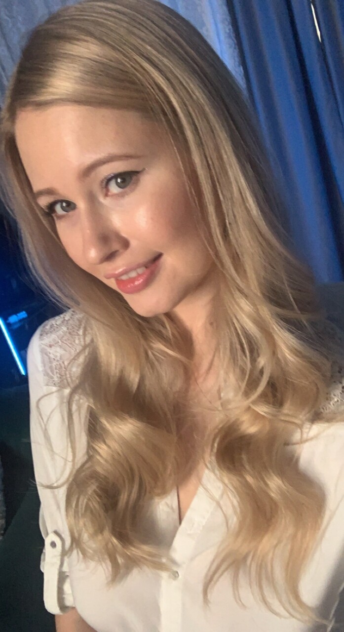 Beautiful blonde girl models non nude by herself to great effect
