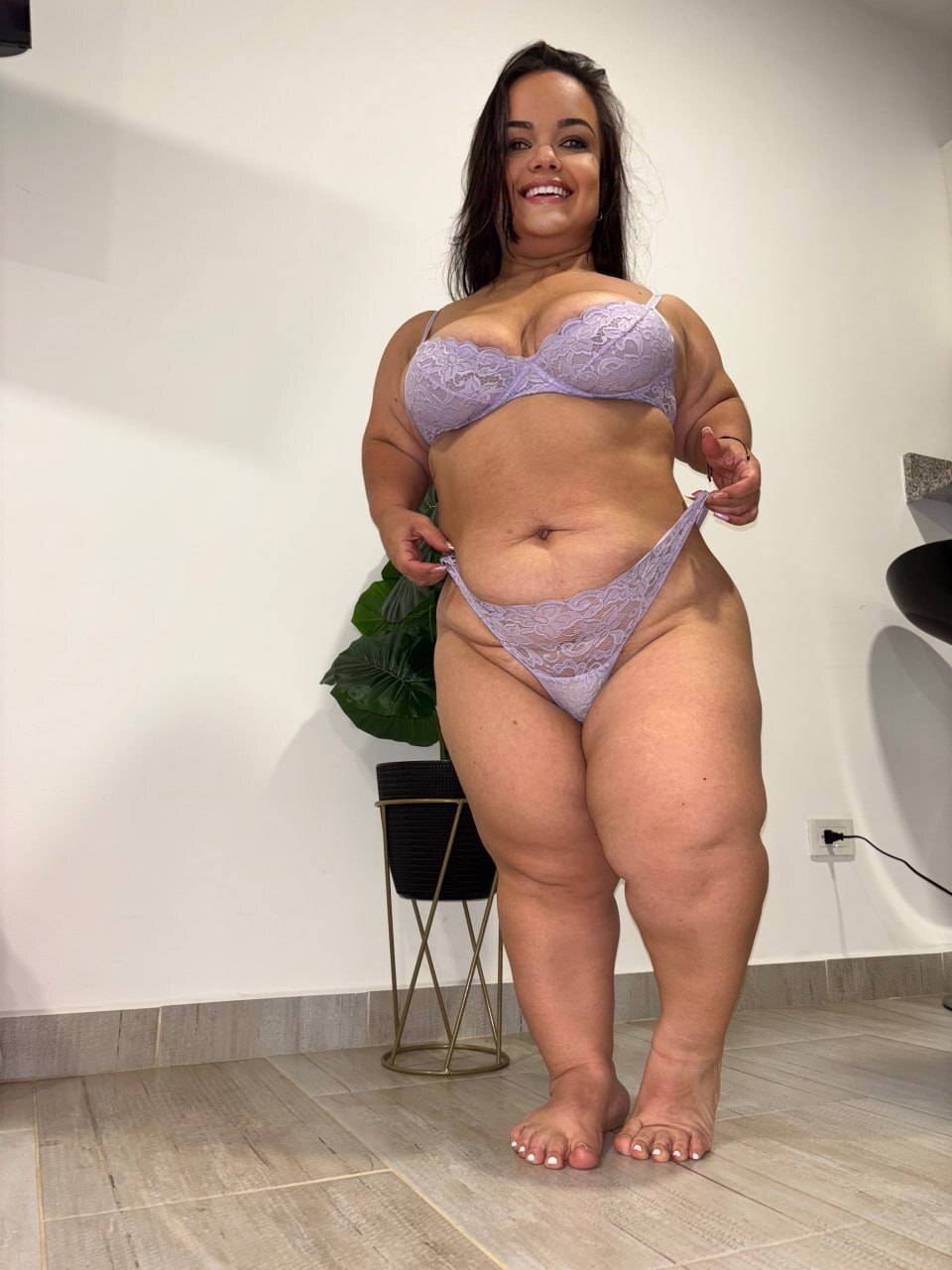Chubby Latina girl takes safe for work selfies in a lace bra and thong