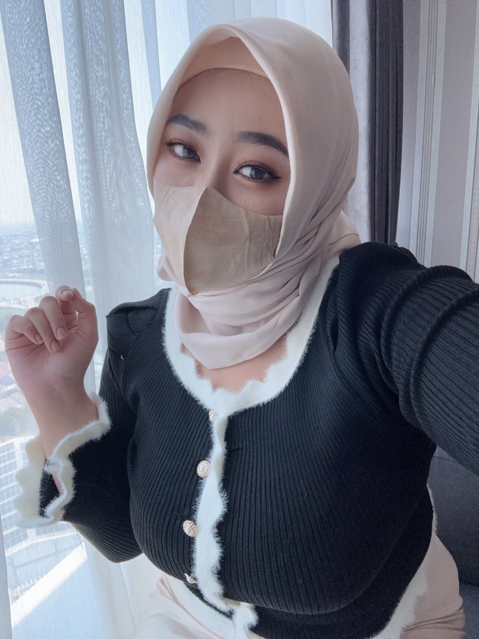 Solo girl exposes her big boobs while wearing a hijab and face mask