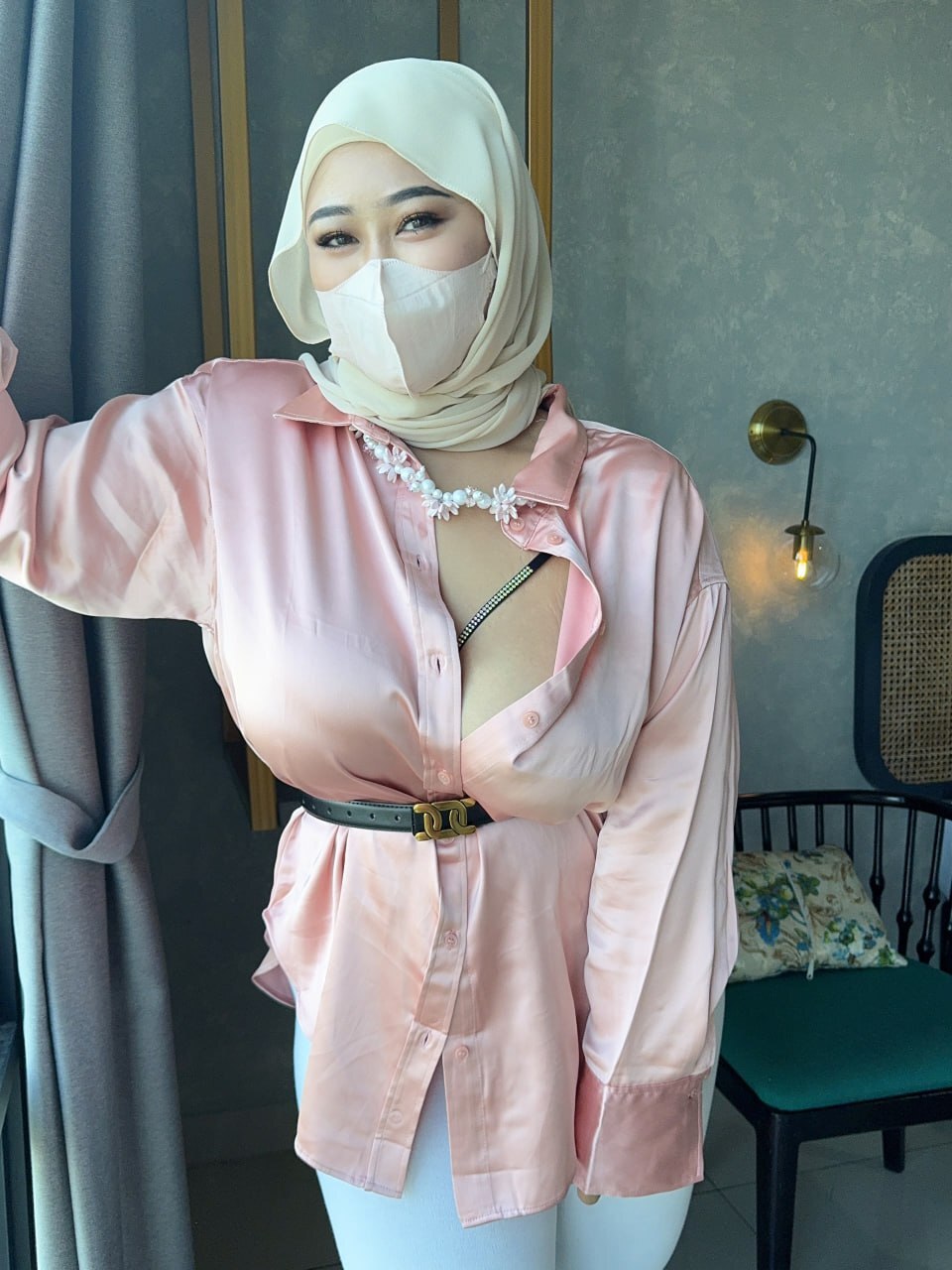 Solo girl with big natural tits undressing to touch her natural tits