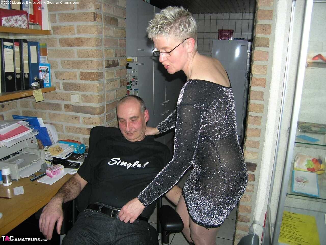 Mature woman Tiffany Pearl seduces a younger man in a black dress
