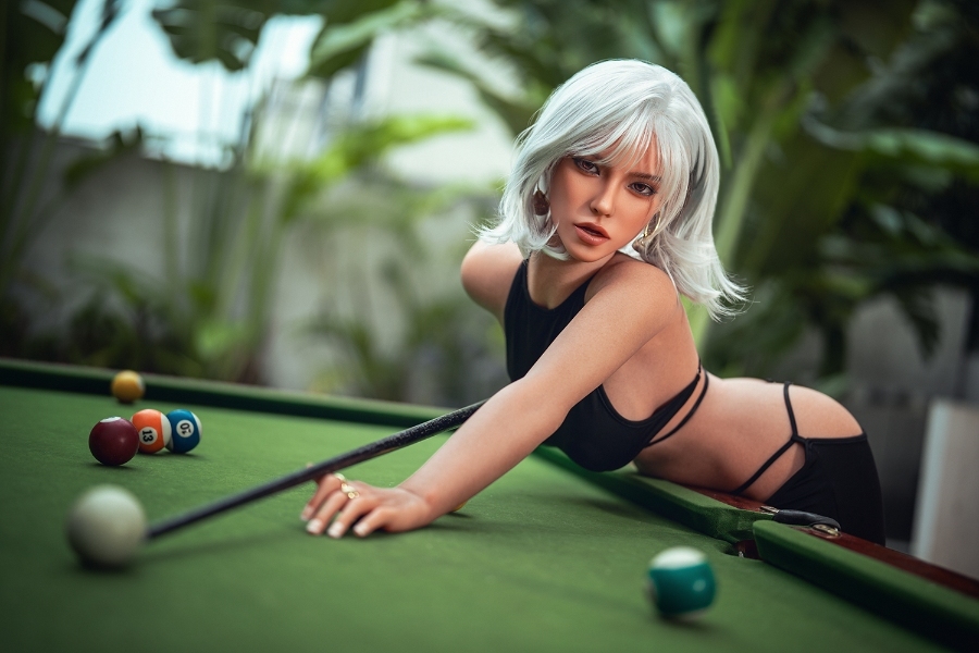 Hot platinum blonde with nice tits and a tight ass playing pool with a doll