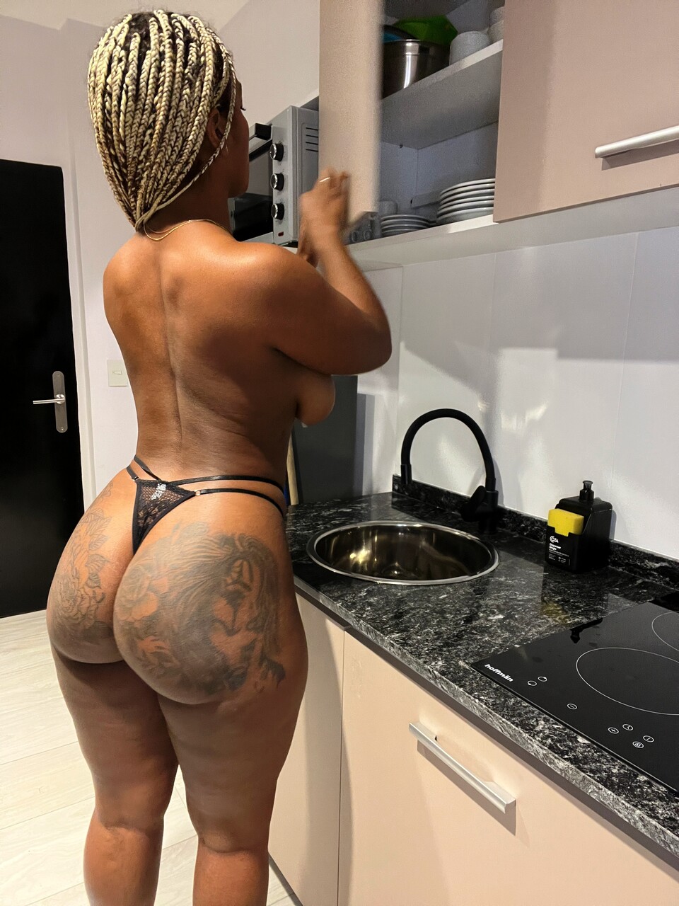 Ebony solo girl with a huge big butt displays her natural tits and hot ass