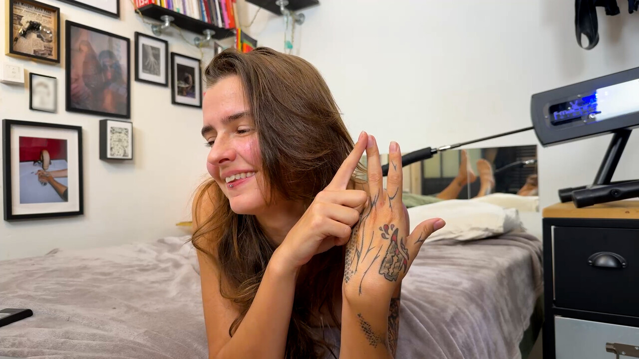 Tattooed amateur gets naked on her bed before masturbating with a sex toy