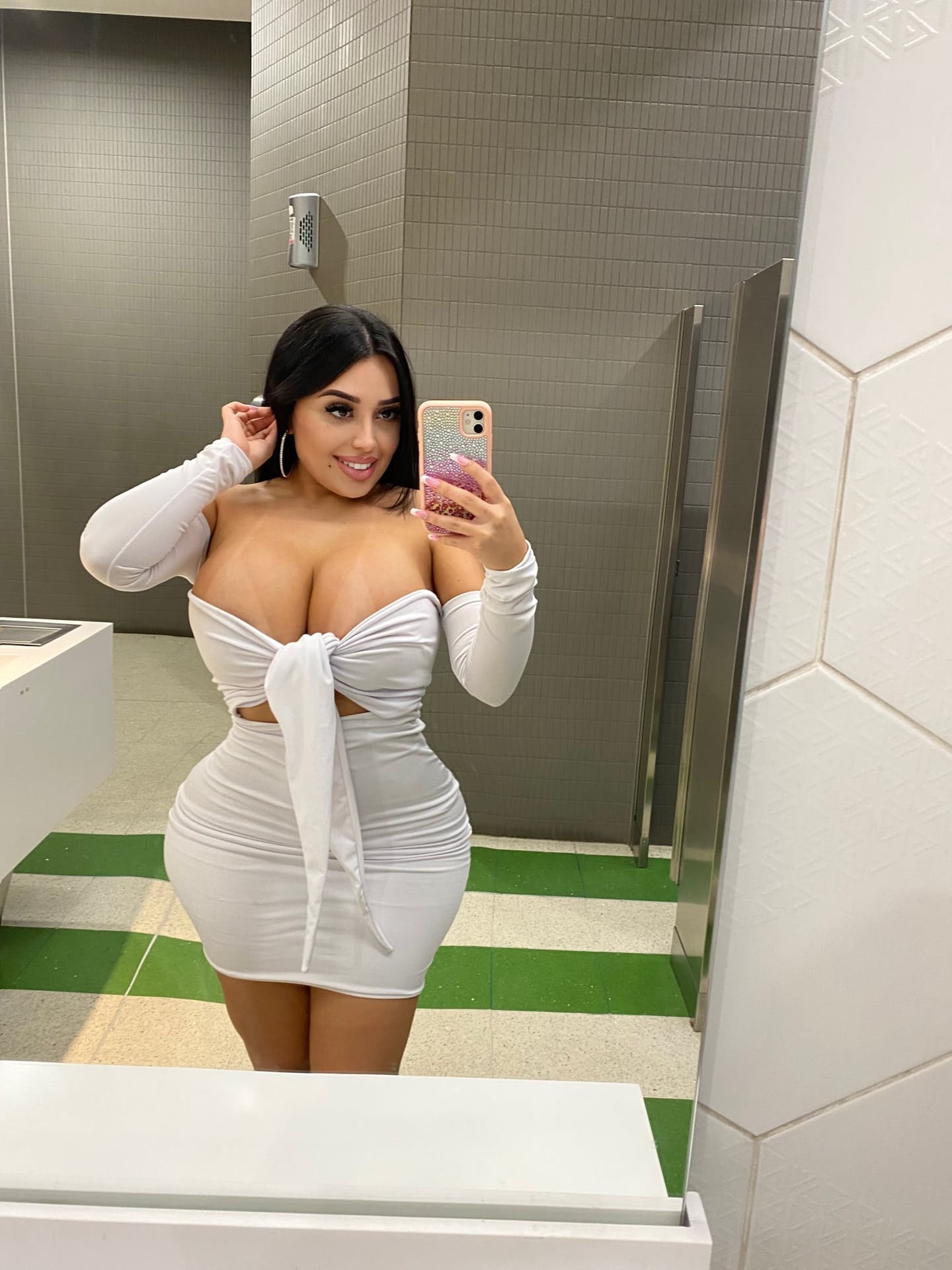 Hot Latina girl shows her huge tits and big ass in public and private locations