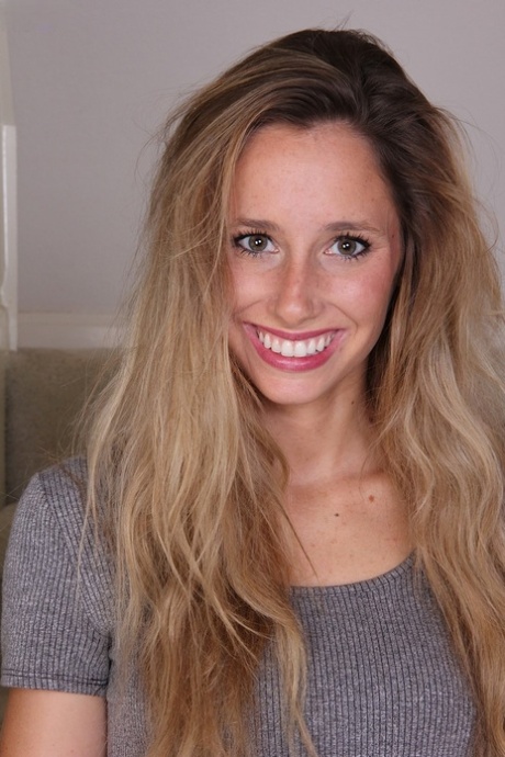College girl Piper Candlewick strips naked on the stairs while sporting long hai