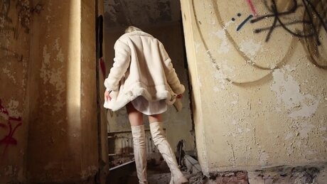 Blonde girl Vasya takes a piss in a run down building