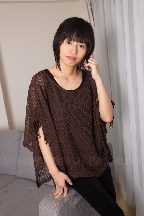 Japanese girl sports short hair while getting completely naked