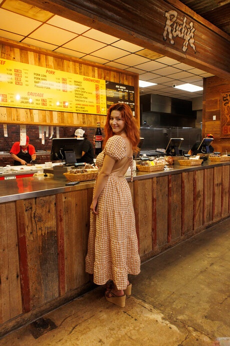 Redheaded girl Keely Rose takes a plate home for a bare ass striptease