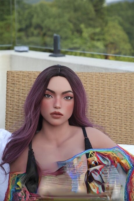 Hot sex doll with striking facial features and long hair in sheer lingerie
