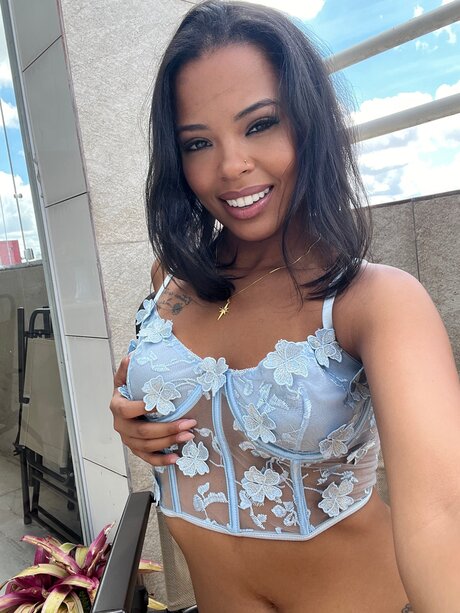 Latina girl takes selfies during solo action in revealing lingerie